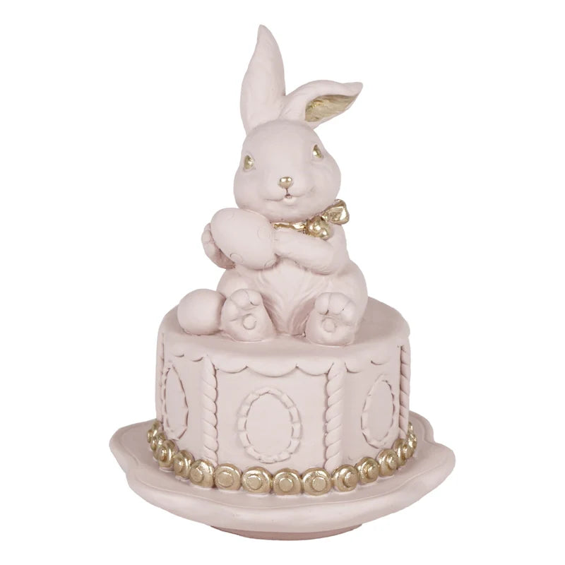 Coniglio su torta rosa/oro