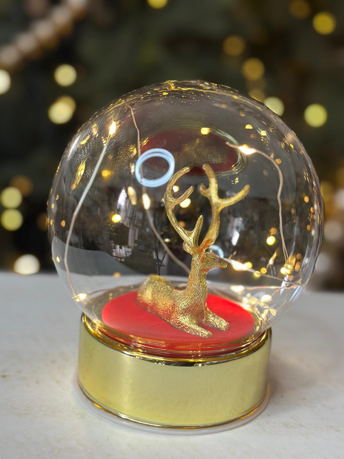 Sfera in vetro con renna oro e base rossa