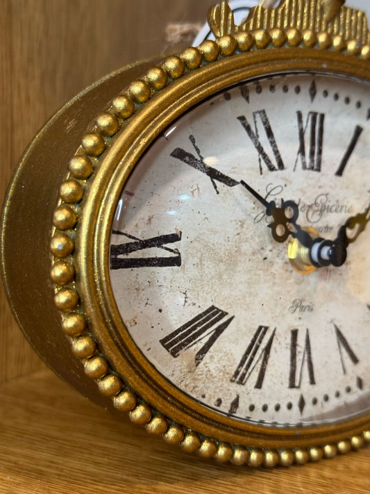 Orologio dorato da tavolo