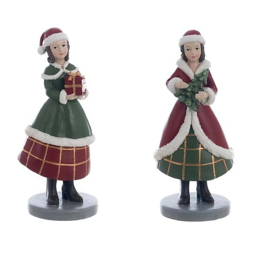 Bambina natalizia statuina rossa e verde