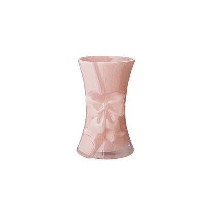 Vaso in vetro rosa con fiocco