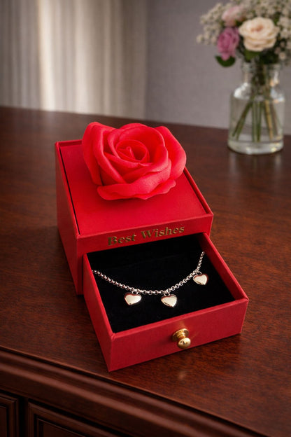 Cofanetto con rosa e bracciale sagapò