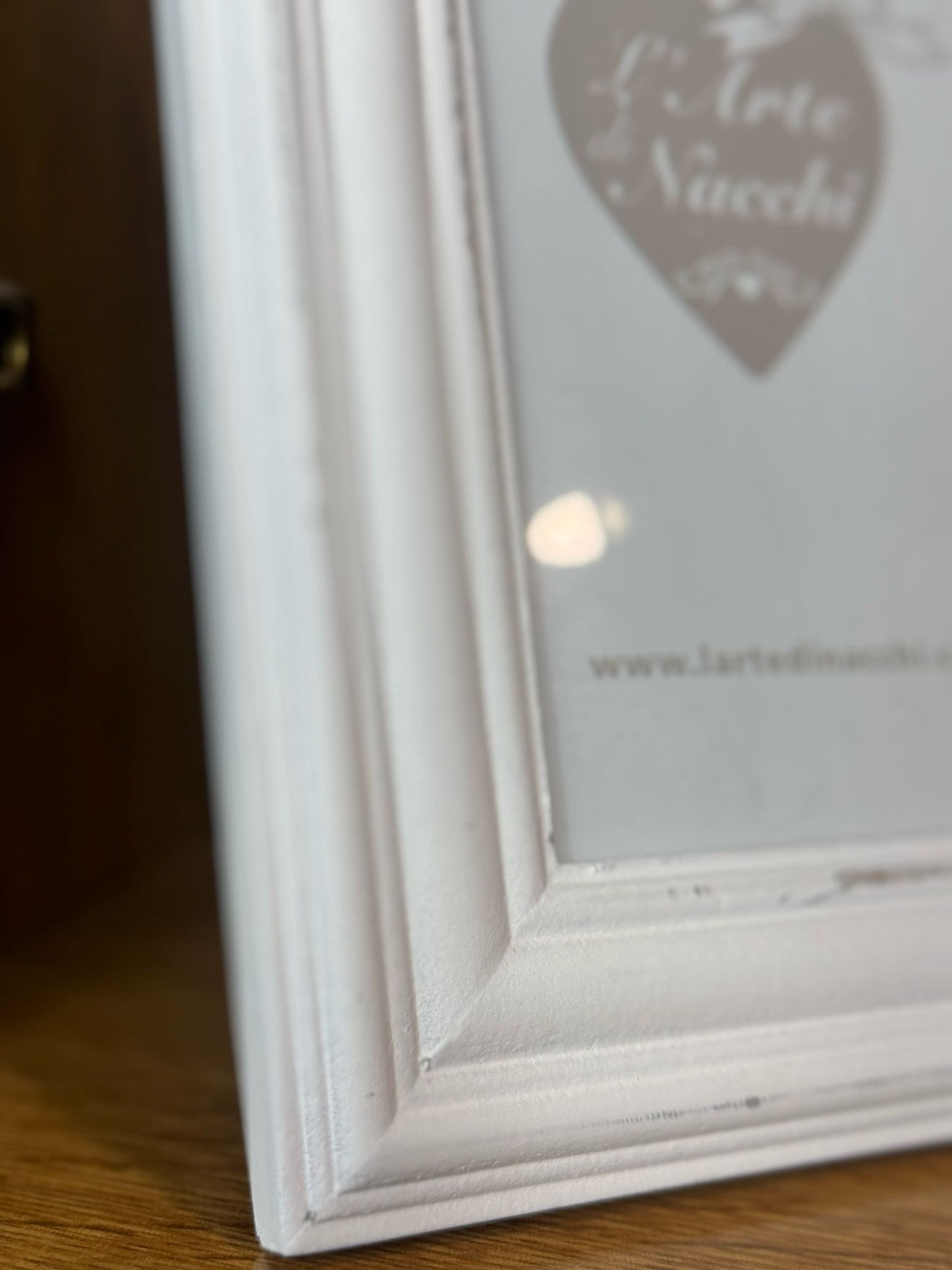 Cornice con fiocco
