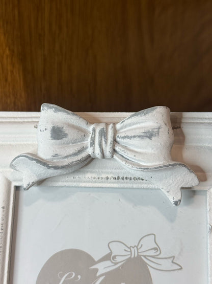 Cornice con fiocco