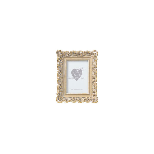 Cornice con decori oro