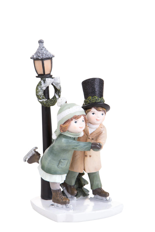 Bambini che sciano statuetta natalizia h.21,2cm| Dino Bianchi